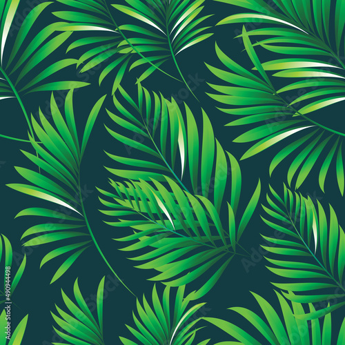 Palm. Seamless pattern of branches and leaves of tropical plants and trees. Vector image. 