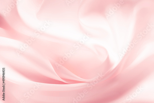 Cosmetic silky cream texture pink background