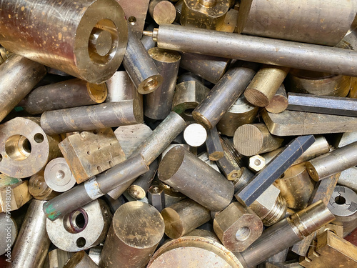 Metal products in the factory scrap brass rods rejects. photo