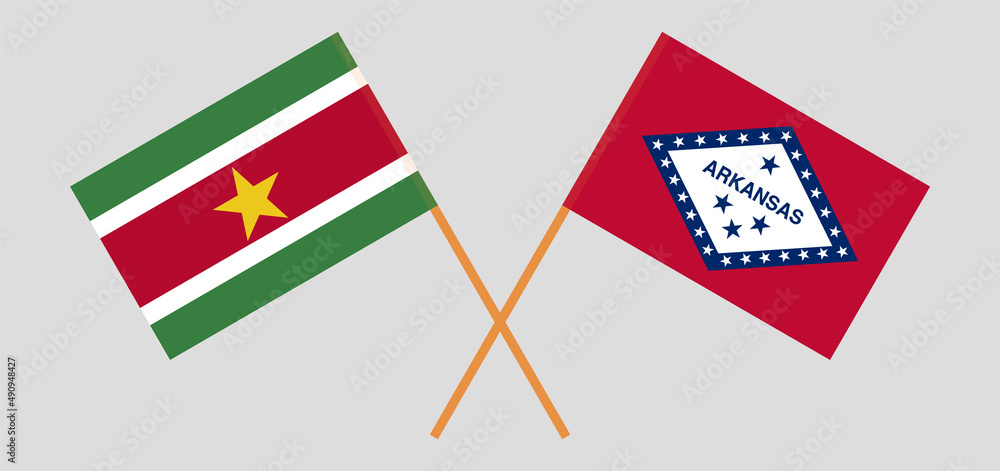 Crossed flags of Suriname and The State of Arkansas. Official colors. Correct proportion