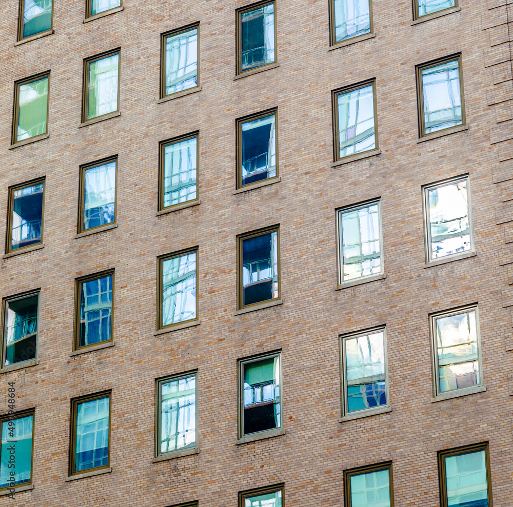 Fototapeta premium high older brick buildings in New York