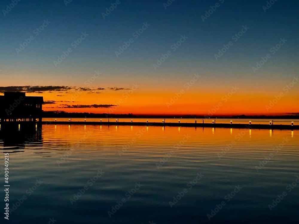 Sunrise colors reflected upon lake