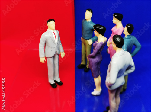 Danish politics symbolised by figurines debating in a blue and a red area where the politicians confront each other photo