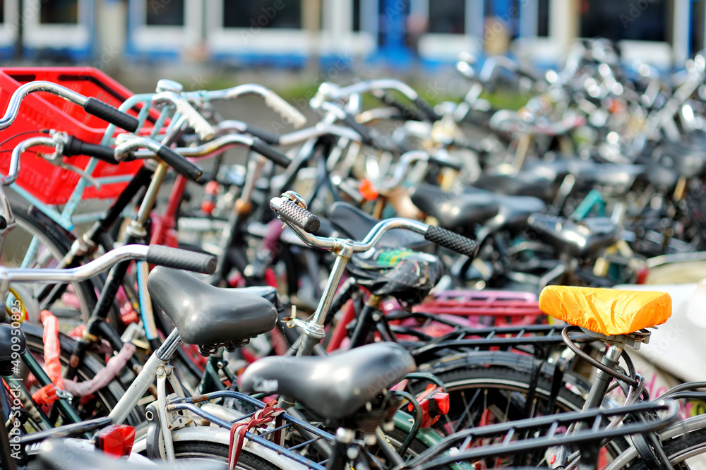 Many bicycles parked on the street of Amsterdam, Netherlands. Many bicycles parked on the street of Amsterdam, Netherlands.