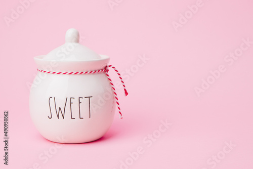sugar jar with the word sweet on it isolated ceramic pot
