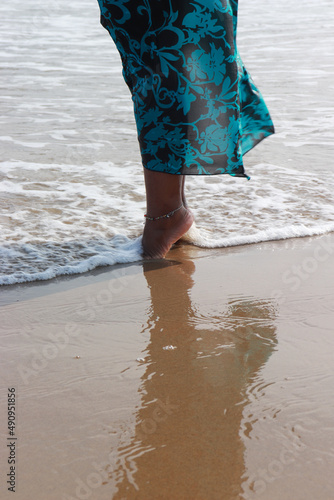 woman walking on the beach