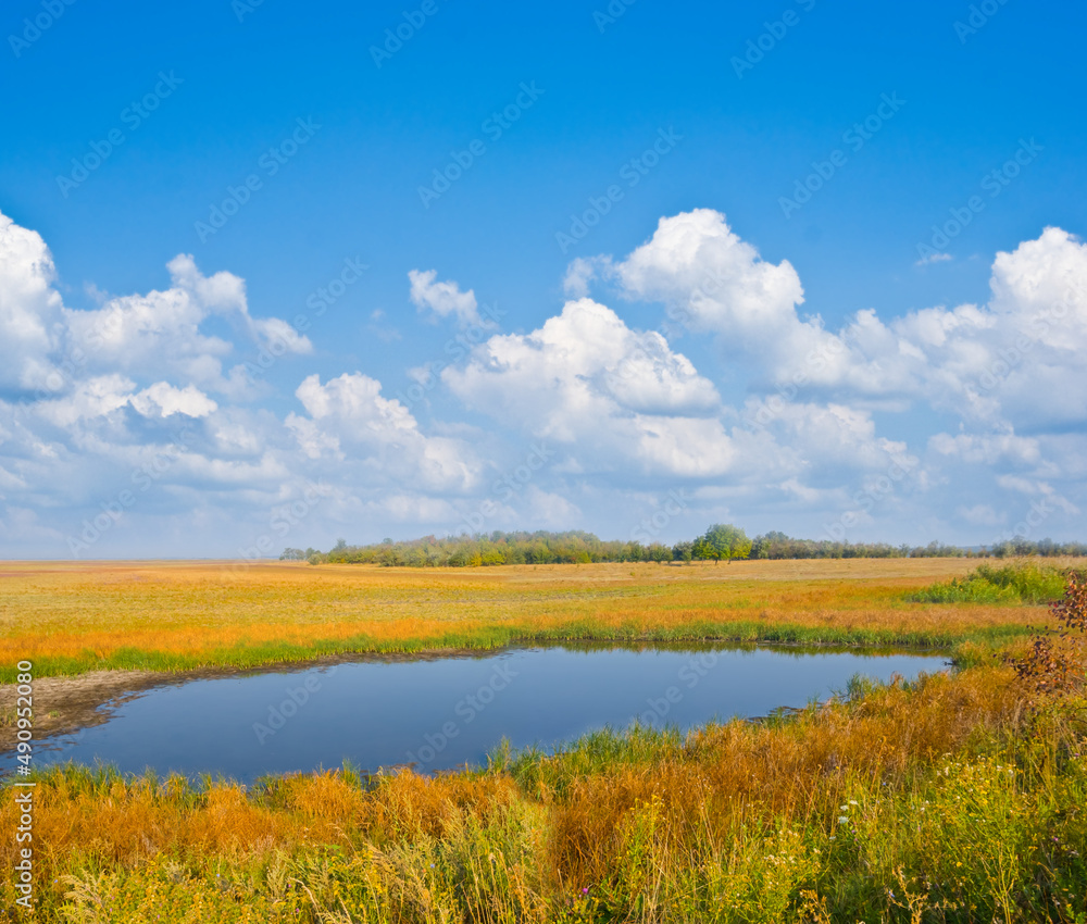 quiet small lake among prairies, summer outdoor scene