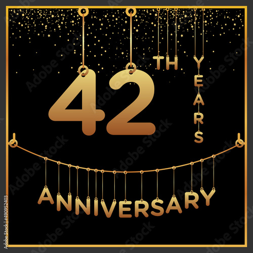 42th years anniversary, vector design for anniversary celebration with gold color on black background, simple and luxury design. logo vector template photo