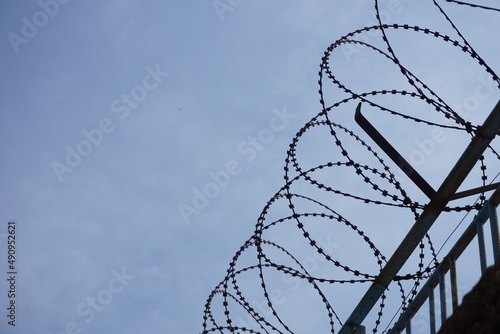 barbed wire and blue sky
