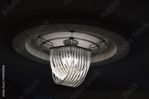 interesting glass chandelier on the ceiling