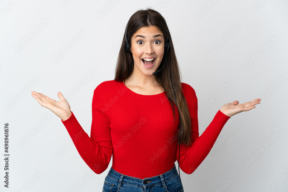 Young Brazilian telemarketer girl over isolated background with shocked facial expression Young Brazilian telemarketer girl over isolated background with shocked facial expression