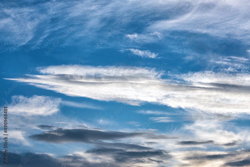 A bright sunset on the background of cloudy sky. A bright sunset on the background of cloudy sky.