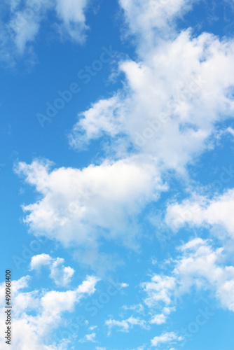 Blank sky surface with small clouds