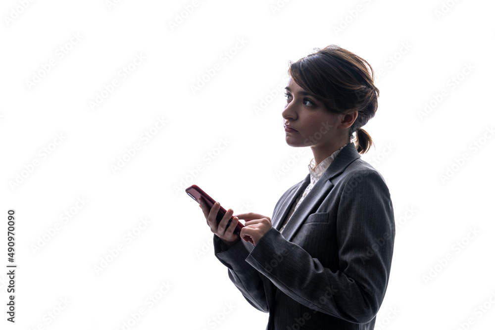 Silhouette of Caucasian woman using a smart phone. Silhouette of Caucasian woman using a smart phone.