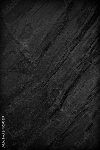 Dark grey black slate background or texture.