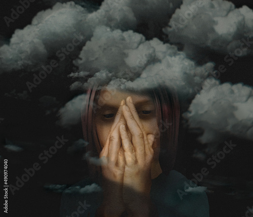 Фотография Clouds, dark ones, surround a depressed woman in a 3-d illustration