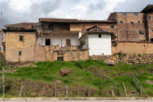 Old building with clay tiles from the time of the Spanish colony on the edge of a road in the department of Boyacá. Colombia.