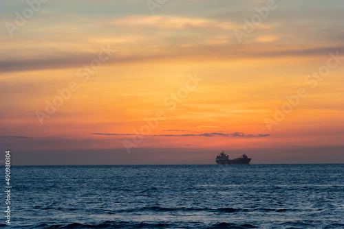 oil tanker ship at sunset in the sea