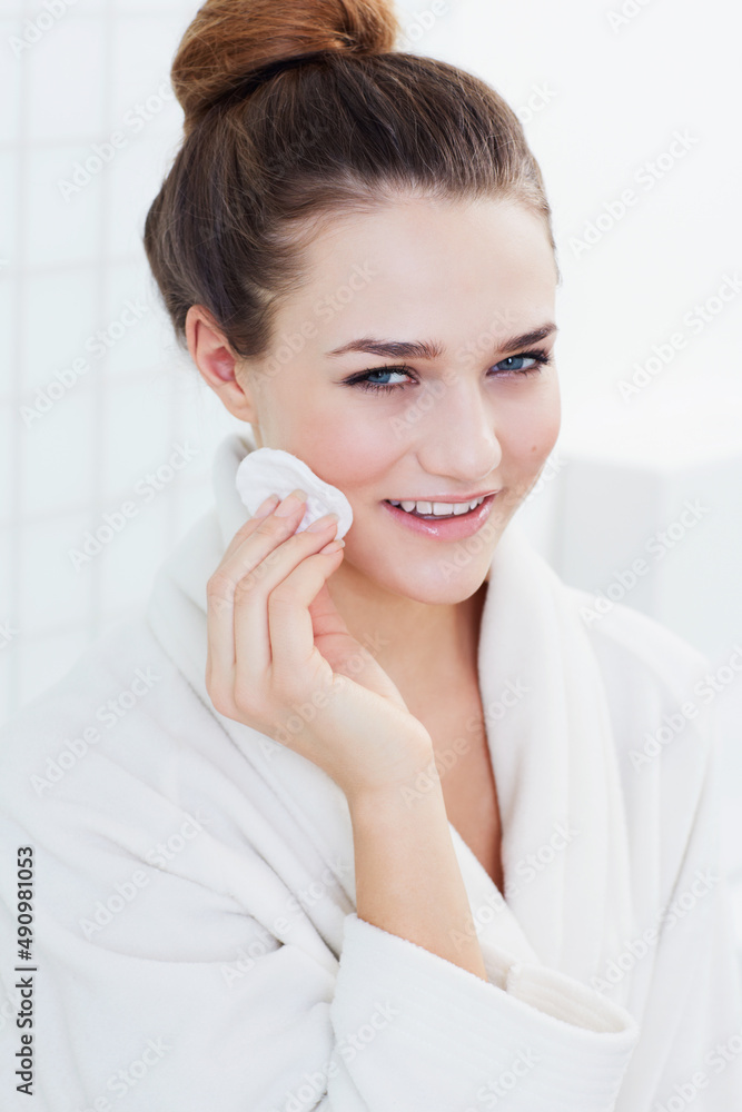 Subtly beautiful. A gorgeous teenage girl cleaning her skin. Subtly beautiful. A gorgeous teenage girl cleaning her skin.