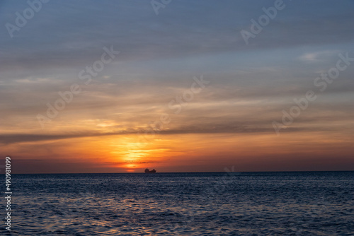 oil tanker ship at sunset in the sea © @mpfotoproducto