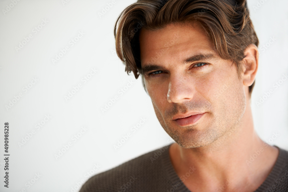 Giving you a sensual stare. Portrait of a handsome young man with copyspace. Giving you a sensual stare. Portrait of a handsome young man with copyspace.