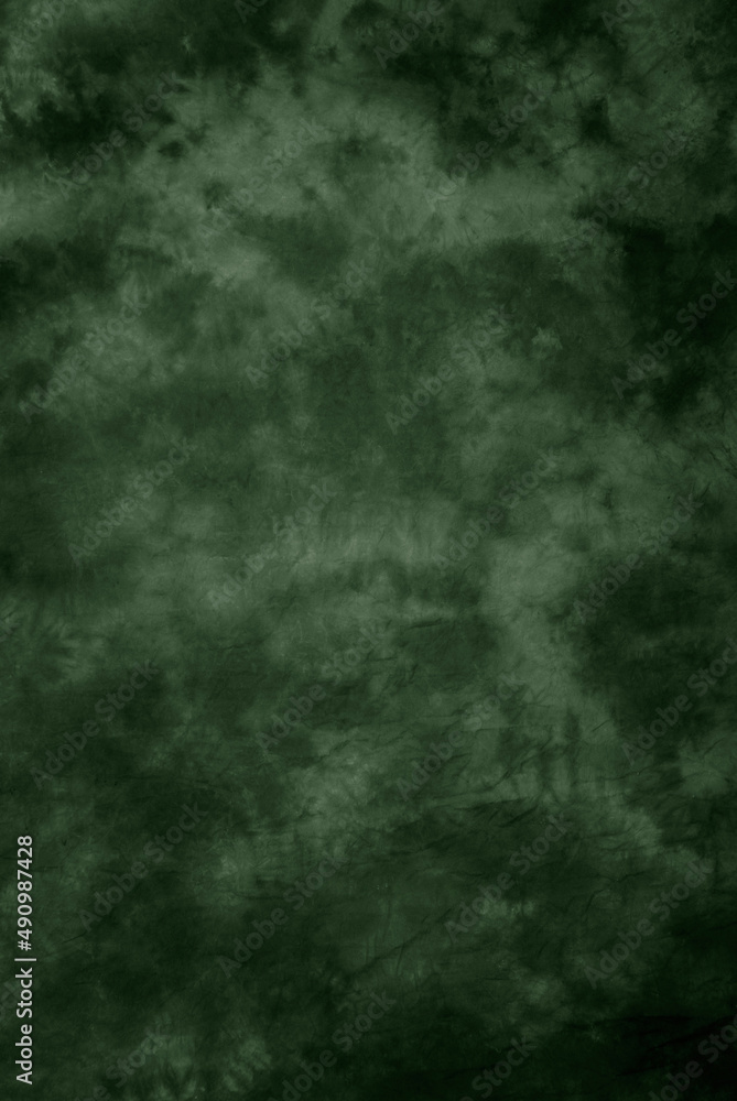 Canvas cloth or muslin photography studio background or backdrop. Classic painted strokes technique,  dark green