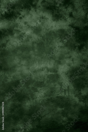 Canvas cloth or muslin photography studio background or backdrop. Classic painted strokes technique   dark green