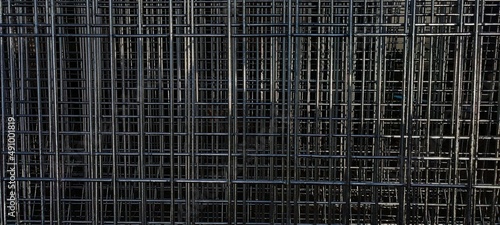 Multiple steel grids stacked together. black and white background