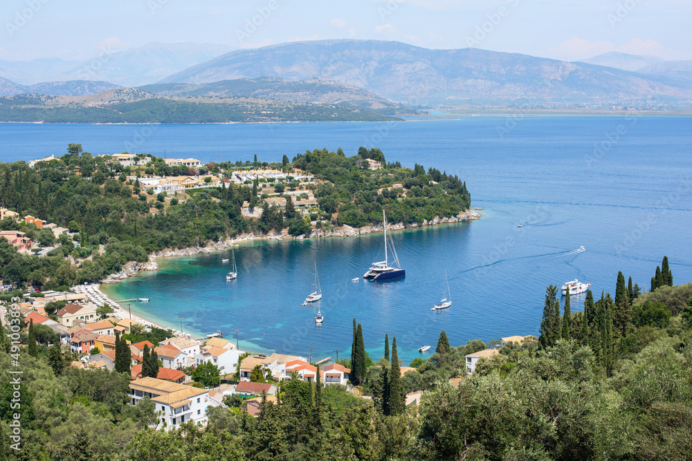 Beautiful bay with beach in Kalami village, Corfu island, Greece. Panoramic top view of beautiful mediterranean landscape