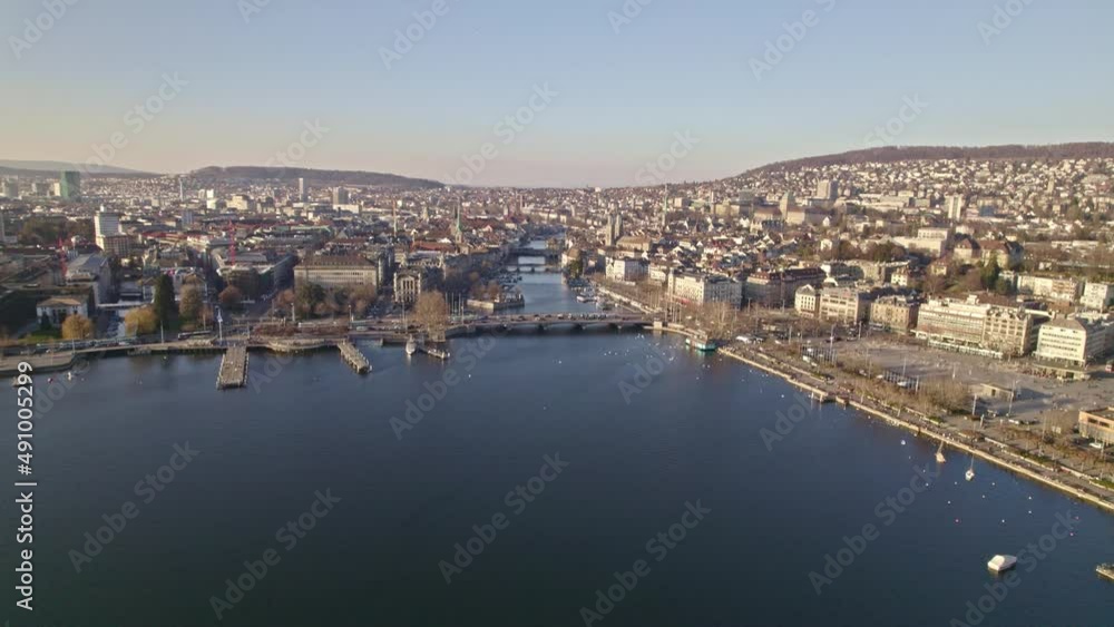 Aerial view of City of Zürich with lake Zürich, river Limmat and medieval old town on a sunny spring day. Movie shot March 4rd, 2022, Zurich, Switzerland. Aerial view of City of Zürich with lake Zürich, river Limmat and medieval old town on a sunny spring day. Movie shot March 4rd, 2022, Zurich, Switzerland.