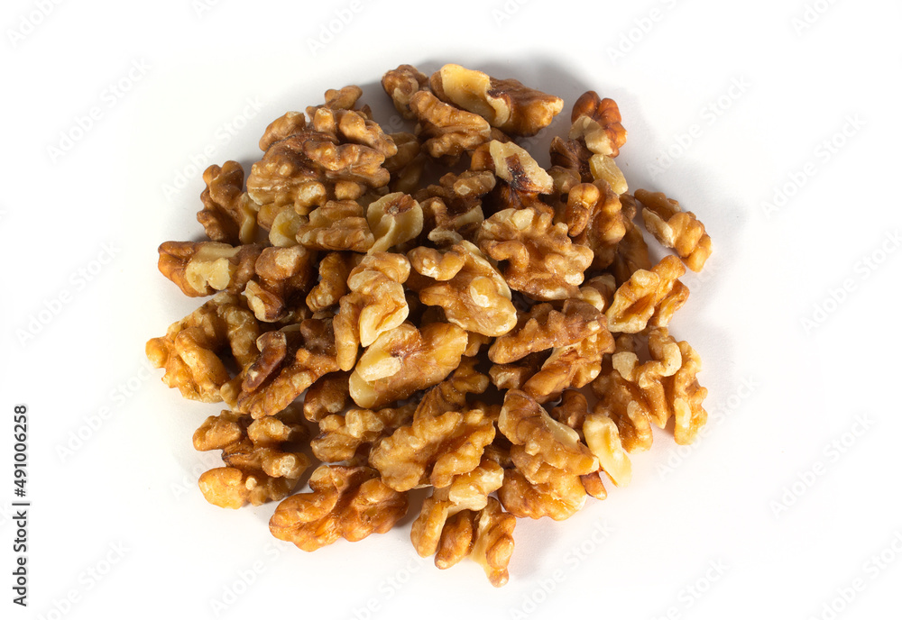 Walnut Nuts in Heap or Pile in Top Down, Flat Lay, or Bird's Eye View, Isolated on White