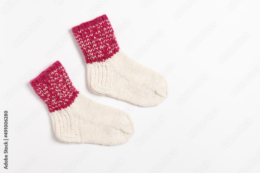 knitted wool socks on a white background knitted wool socks on a white background