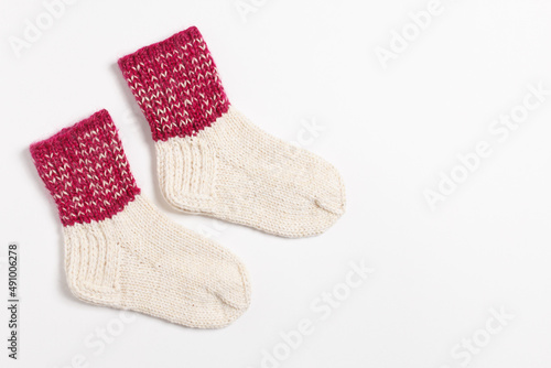 knitted wool socks on a white background