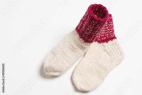 knitted wool socks on a white background