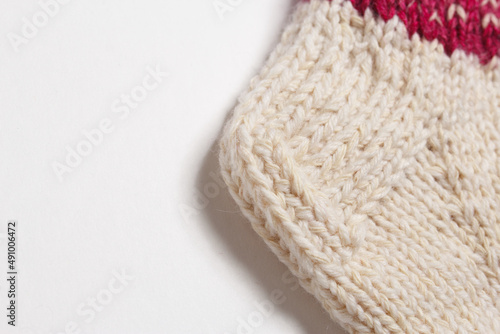 knitted wool socks on a white background