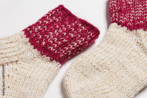 knitted wool socks on a white background