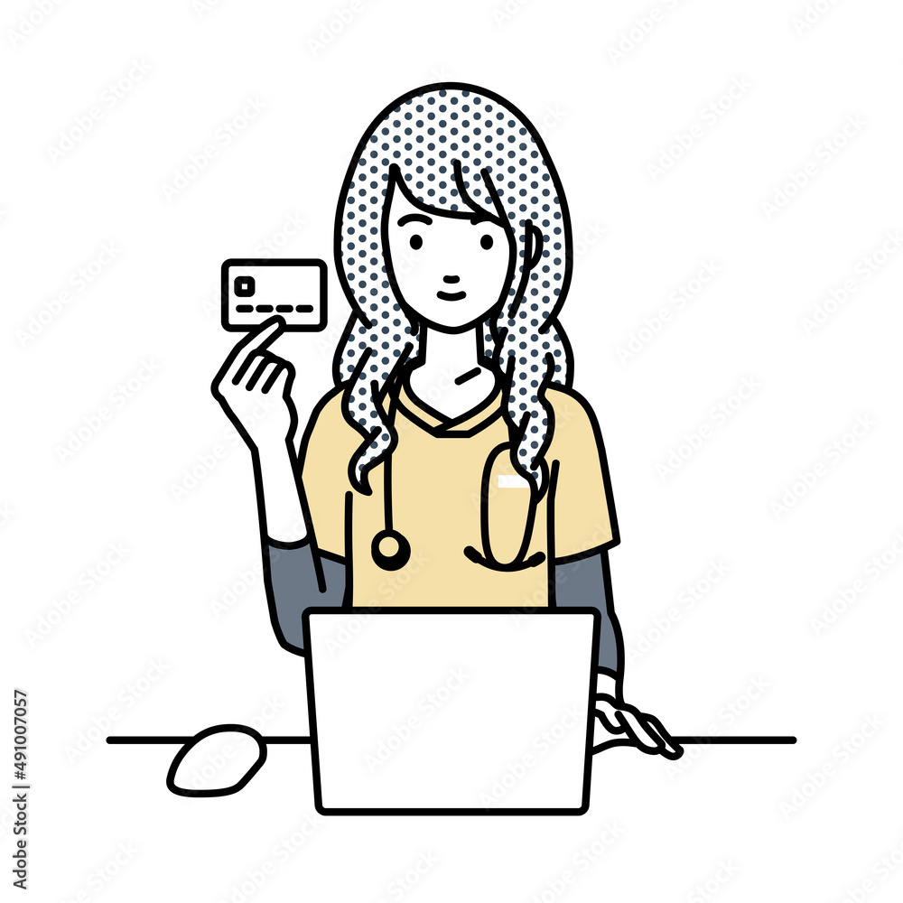 デスクで座ってPCを使いながらクレジットカードを手に持っている看護師の女性 デスクで座ってPCを使いながらクレジットカードを手に持っている看護師の女性