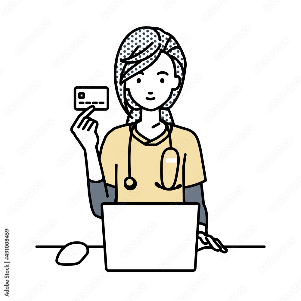デスクで座ってPCを使いながらクレジットカードを手に持っている看護師の女性 デスクで座ってPCを使いながらクレジットカードを手に持っている看護師の女性