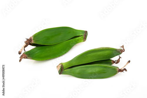 Musa balbisiana on white background.It is a popular fruit that is eaten raw.The fruit contains a large number of seeds photo