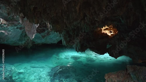 Underwater caves of Yucatan Mexico cenotes. Tourism and nature concept. Cave diving in clean and clear underground water. High quality 4k footage