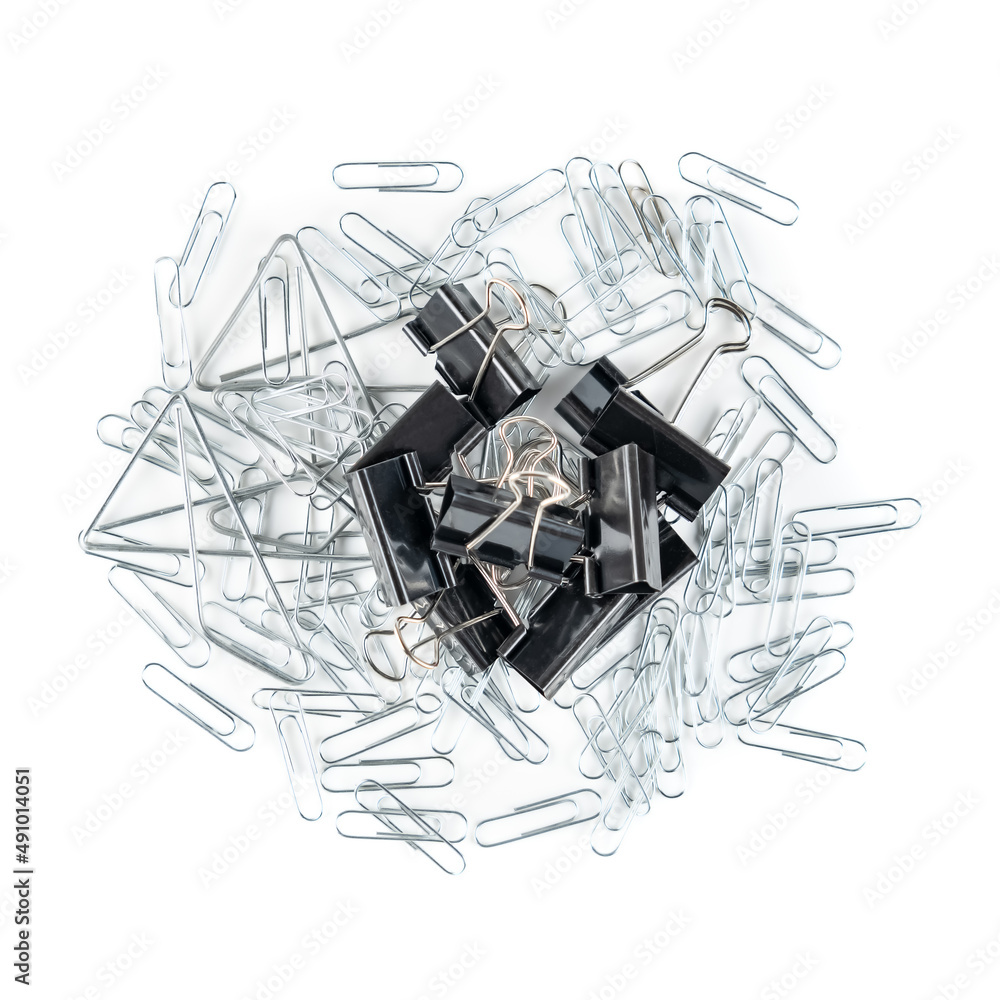 Set of clips and clamps of different sizes to hold sheets of paper, isolated on white background.