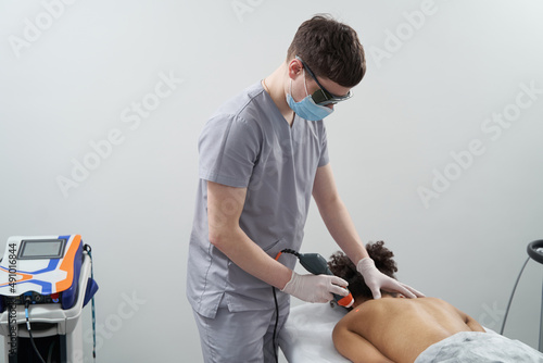 Close-up photo of medical worker on massage session