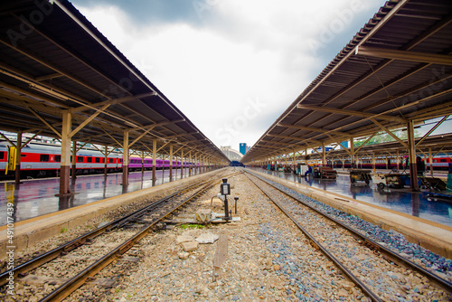 Railroad tracks and platforms with railway station roofs