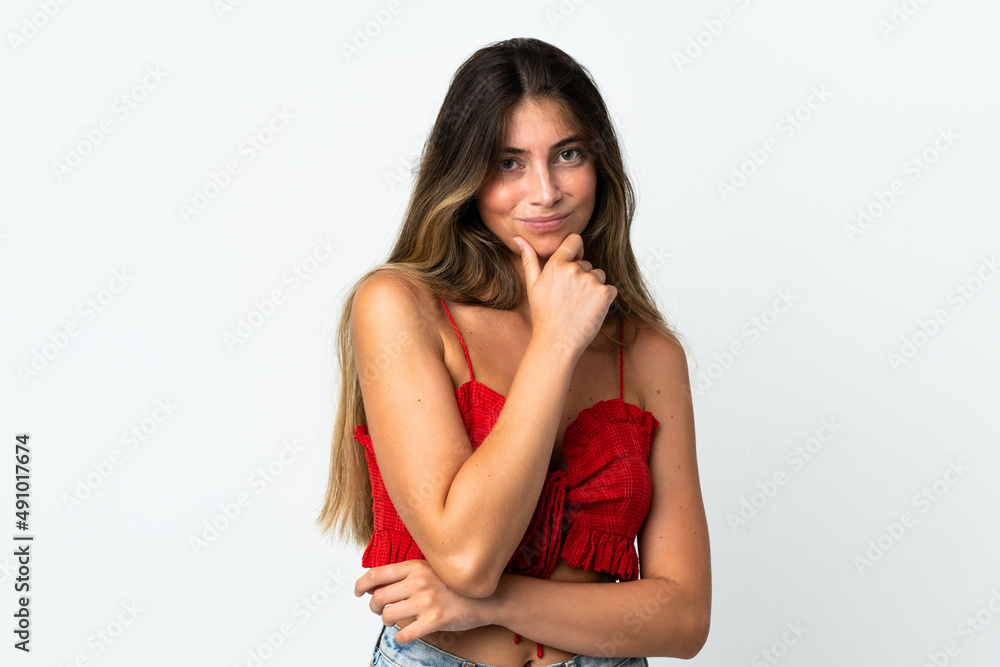 Young caucasian woman isolated on white background having doubts Young caucasian woman isolated on white background having doubts