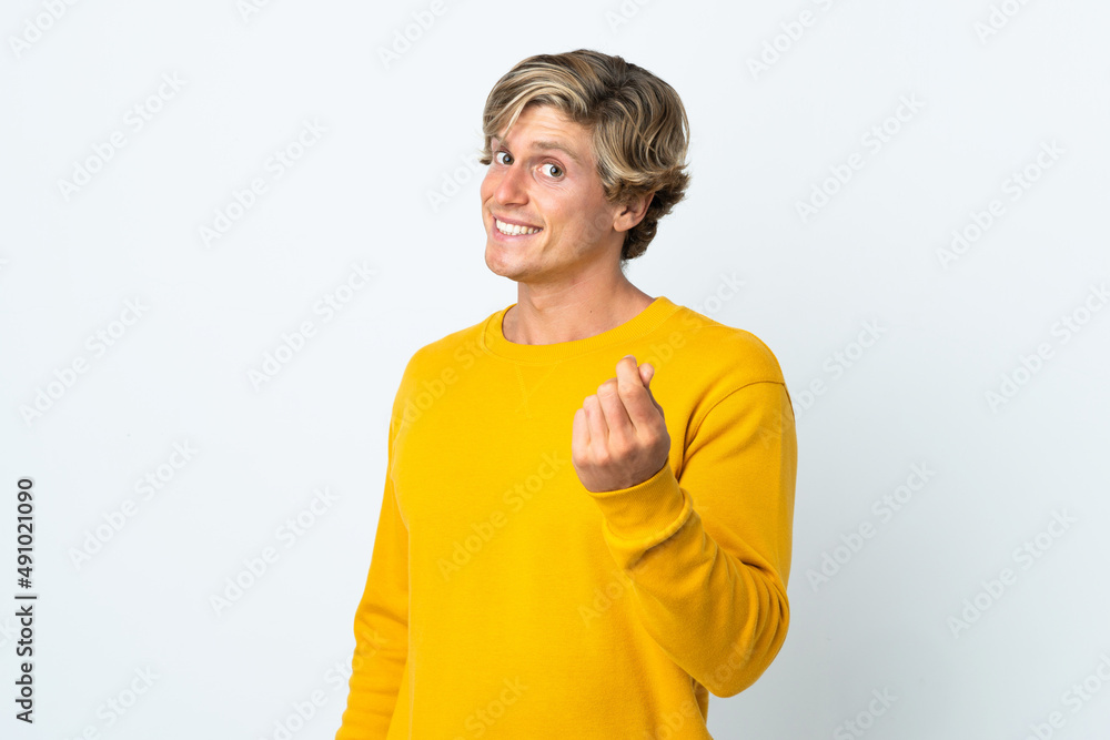 English man over isolated white background making money gesture English man over isolated white background making money gesture