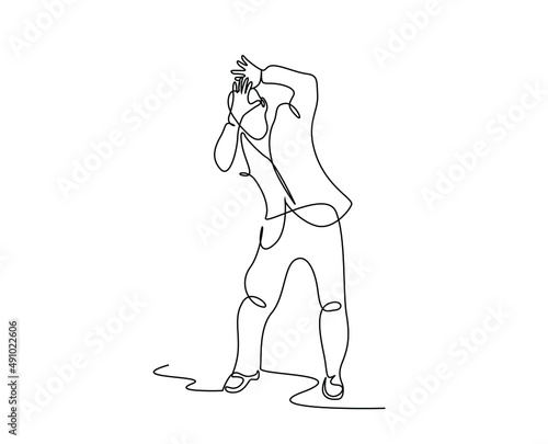 scared worried businessman trying to protect himself by raising his hands up