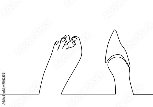 woman wearing uncomfortable, faulty heels. woman with crooked toes after wearing uncomfortable shoes