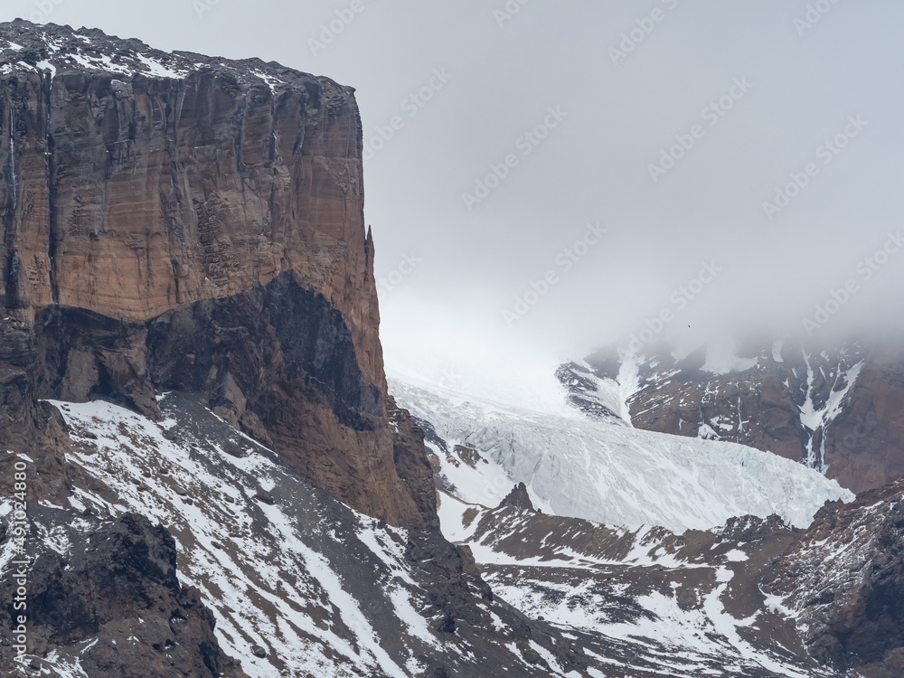 View of the brown bluff, a stunning basalt tuya on the Tabarin Peninsula of northern Antarctica. Formed 1 million years ago by a subglacial volcanic eruptions