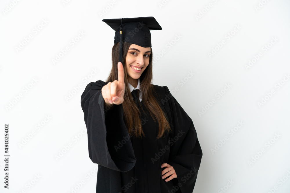 Young university graduate isolated on white background showing and lifting a finger Young university graduate isolated on white background showing and lifting a finger