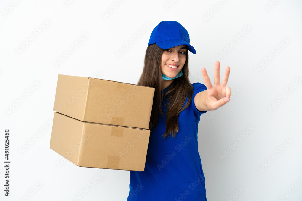 Delivery caucasian woman isolated on white background happy and counting three with fingers Delivery caucasian woman isolated on white background happy and counting three with fingers